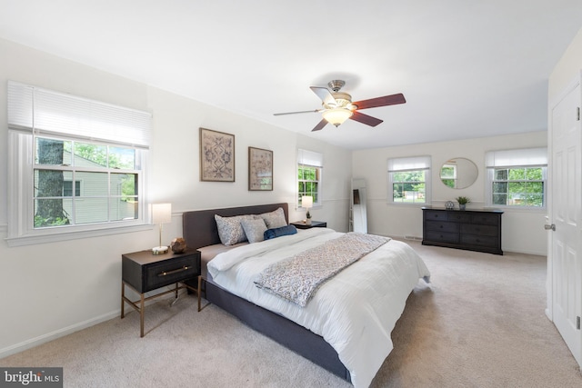 4017 Spring Valley Dr, White Plains, MD 20695 - bedroom with light carpet, a ceiling fan, and baseboards