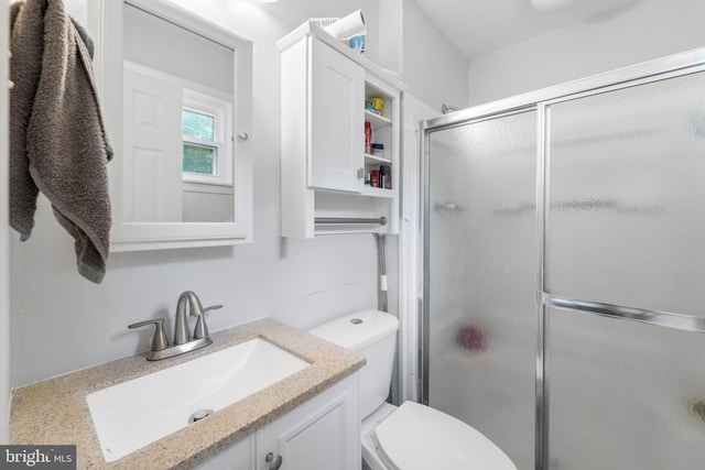 4017 Spring Valley Dr, White Plains, MD 20695 - bathroom featuring a stall shower, toilet, and vanity