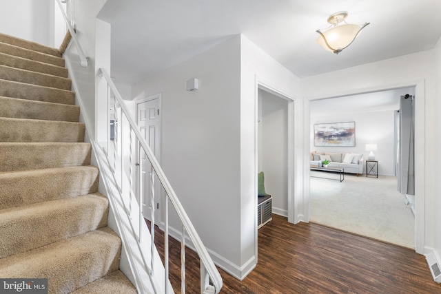 4017 Spring Valley Dr, White Plains, MD 20695 - stairs featuring wood finished floors and baseboards
