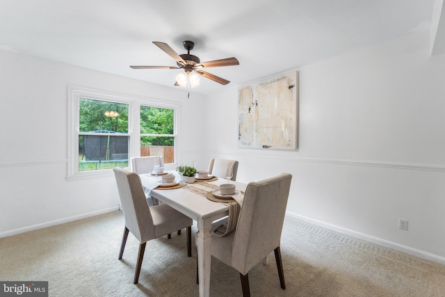 4017 Spring Valley Dr, White Plains, MD 20695 - dining room with carpet flooring, a ceiling fan, and baseboards