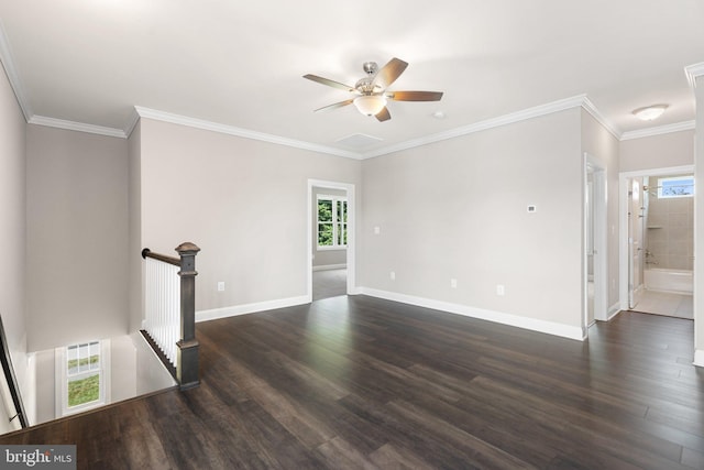 165 Green St, Warrenton, VA 20186 - unfurnished room with dark wood-style flooring, baseboards, a ceiling fan, and crown molding