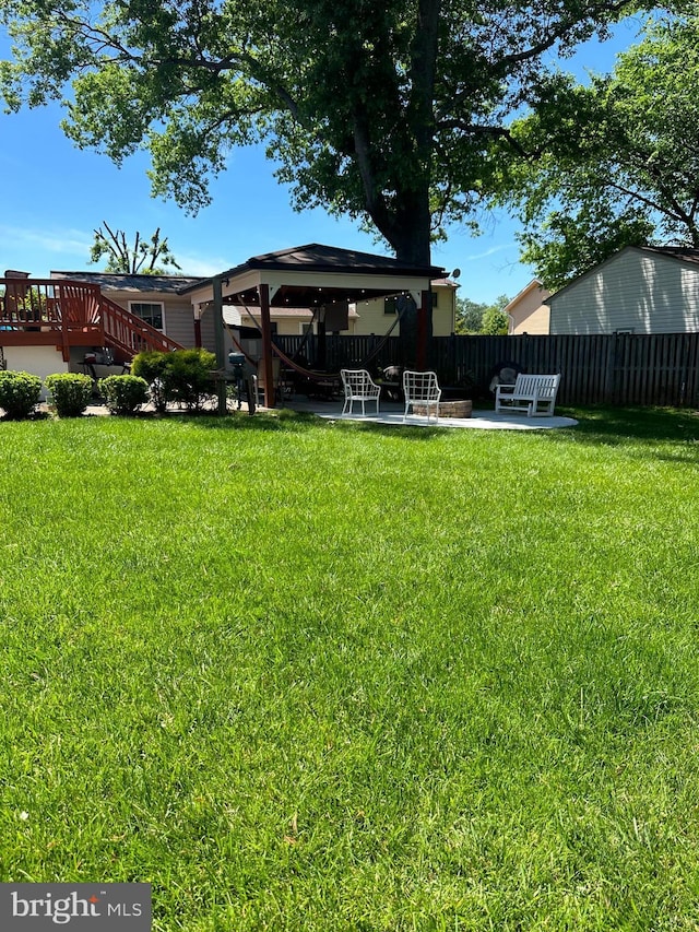 view of yard with a gazebo and a patio area