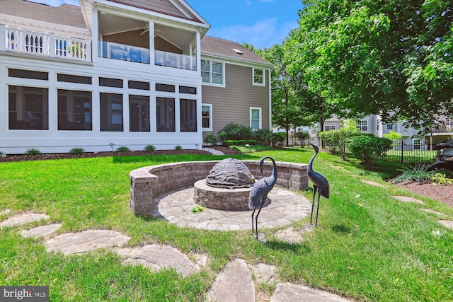 853 Imperial Rd, Arnold, MD 21012 - back of property featuring an outdoor fire pit and a shingled roof