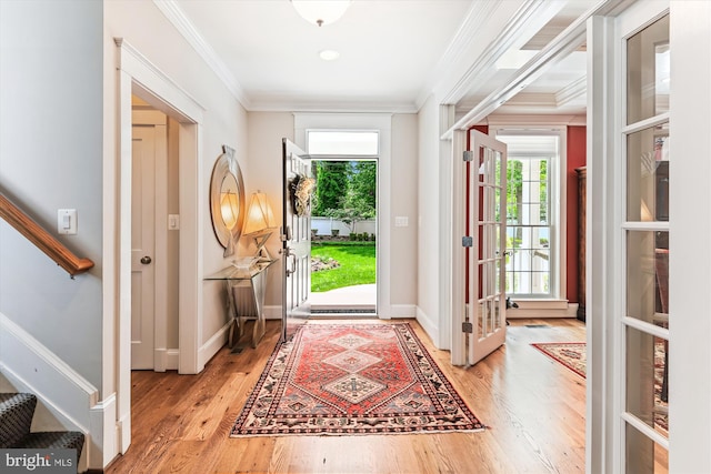 853 Imperial Rd, Arnold, MD 21012 - entryway with plenty of natural light, light wood-style flooring, stairway, ornamental molding, and baseboards