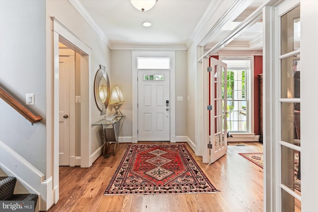 853 Imperial Rd, Arnold, MD 21012 - entryway with crown molding, stairs, light wood finished floors, and baseboards