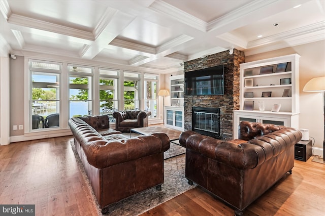 853 Imperial Rd, Arnold, MD 21012 - living room featuring healthy amount of natural light, a fireplace, crown molding, beamed ceiling, and wood finished floors