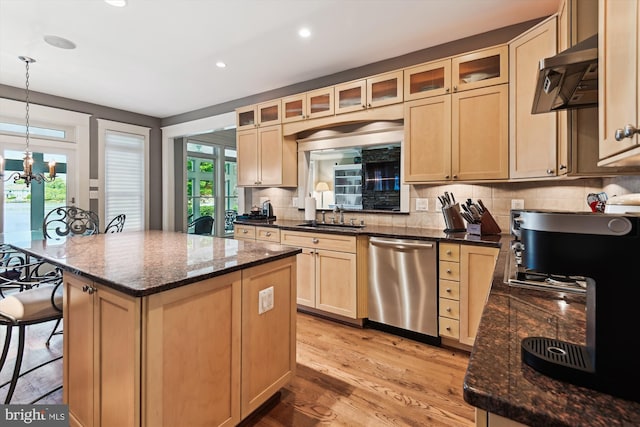853 Imperial Rd, Arnold, MD 21012 - kitchen with stainless steel dishwasher, extractor fan, a kitchen island, decorative backsplash, and a sink