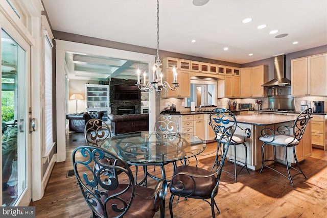 853 Imperial Rd, Arnold, MD 21012 - dining space with a chandelier, a fireplace, wood finished floors, and recessed lighting