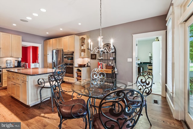 853 Imperial Rd, Arnold, MD 21012 - dining area with wood finished floors, a chandelier, and recessed lighting