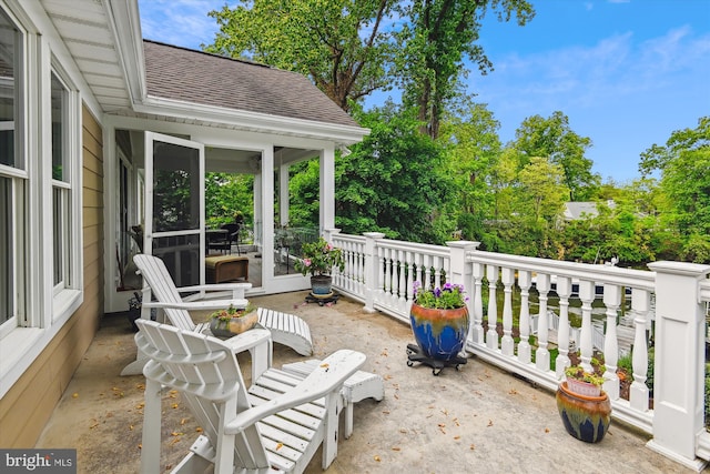 853 Imperial Rd, Arnold, MD 21012 - view of patio with a sunroom and view of wooded area