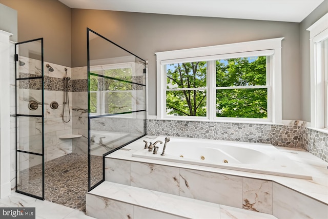 853 Imperial Rd, Arnold, MD 21012 - full bath featuring plenty of natural light, a marble finish shower, a tub with jets, lofted ceiling, and marble finish floors