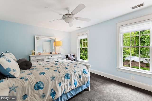 853 Imperial Rd, Arnold, MD 21012 - bedroom featuring dark colored carpet, multiple windows, baseboards, and a ceiling fan