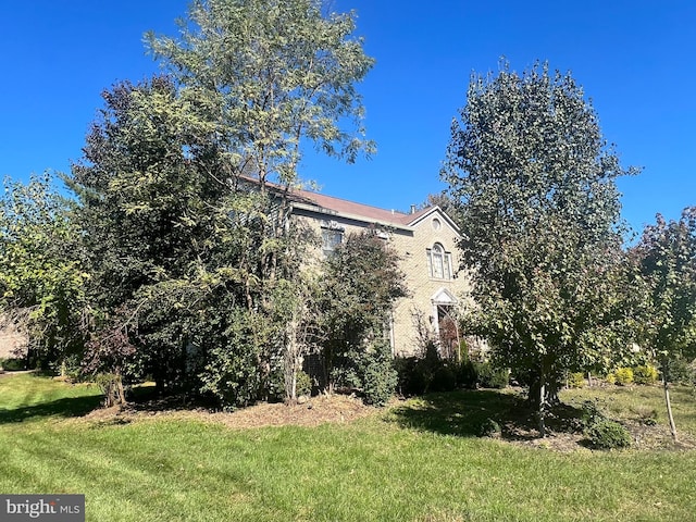15202 Wetherburn Dr, Centreville, VA 20120 - view of property exterior with a lawn