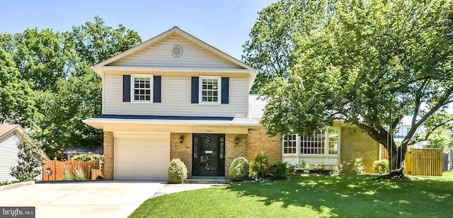 view of front facade with an attached garage, driveway, and brick siding