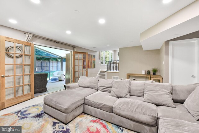 living room featuring recessed lighting