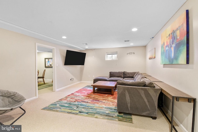living room with carpet flooring, recessed lighting, and baseboards