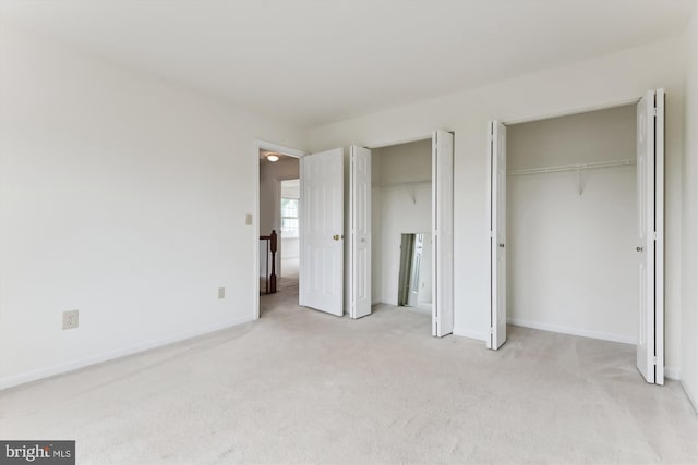 389 Mattapany Ct, Arnold, MD 21012 - unfurnished bedroom featuring multiple closets, carpet flooring, and baseboards