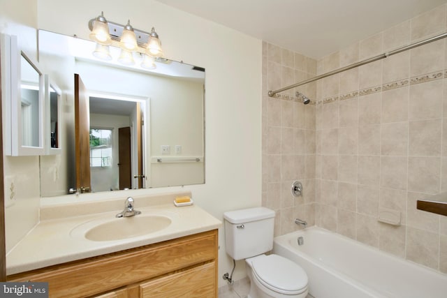 full bath with vanity, toilet, and shower / bath combination
