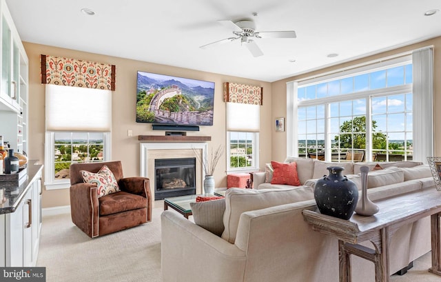 1123 Riverview Ln, Conshohocken, PA 19428 - living area with a premium fireplace, ceiling fan, light carpet, and recessed lighting