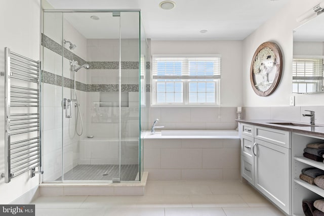 1123 Riverview Ln, Conshohocken, PA 19428 - bathroom featuring radiator heating unit, a shower stall, a bath, vanity, and tile patterned floors