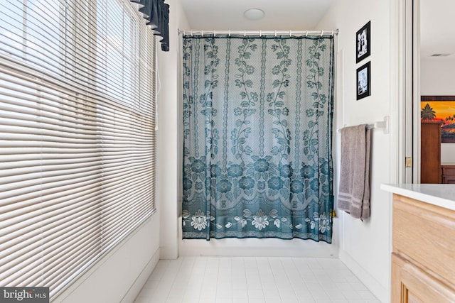 1123 Riverview Ln, Conshohocken, PA 19428 - full bath featuring shower / tub combo with curtain and tile patterned flooring
