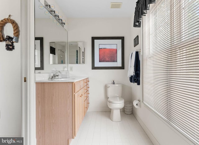 1123 Riverview Ln, Conshohocken, PA 19428 - bathroom with toilet, tile patterned floors, and vanity
