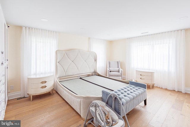 bedroom featuring wood-type flooring