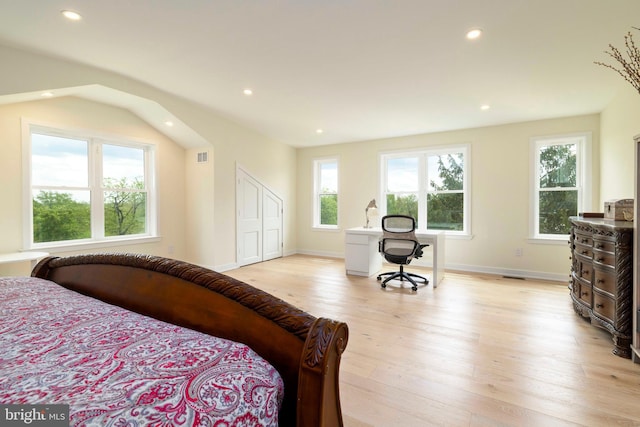bedroom featuring recessed lighting, light wood-style floors, and baseboards