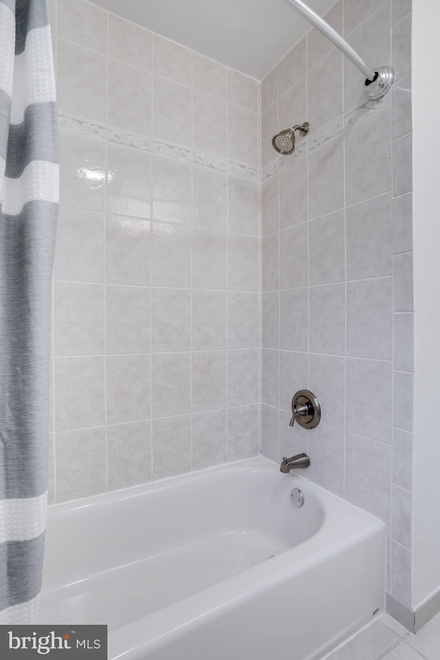 7530 Royce Ct, Annandale, VA 22003 - bathroom with shower / tub combo and tile patterned flooring