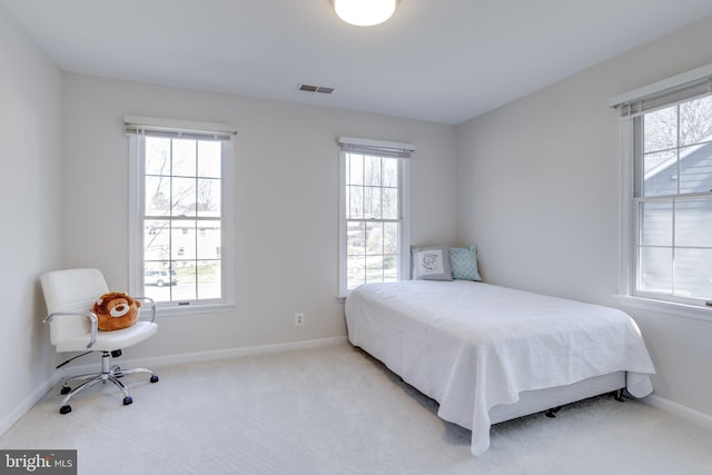 7530 Royce Ct, Annandale, VA 22003 - bedroom with multiple windows, carpet, and baseboards