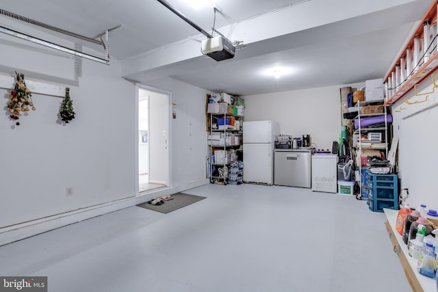 7530 Royce Ct, Annandale, VA 22003 - garage with freestanding refrigerator, refrigerator, and a garage door opener