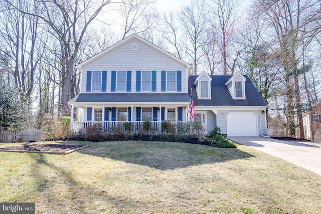 7530 Royce Ct, Annandale, VA 22003 - view of front of home featuring driveway, a porch, a front lawn, and a garage