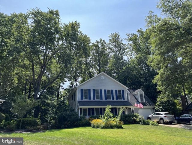 7530 Royce Ct, Annandale, VA 22003 - view of front of home featuring a garage, a front lawn, and driveway