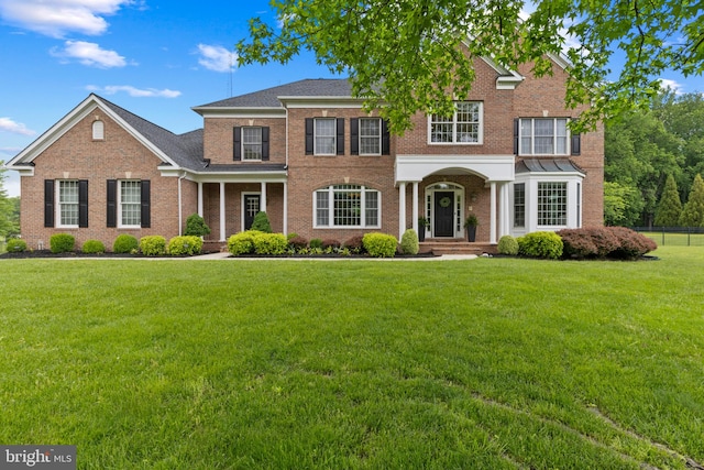 1002 Queen Annes Lace Way, Annapolis, MD 21401 - colonial inspired home featuring brick siding and a front lawn