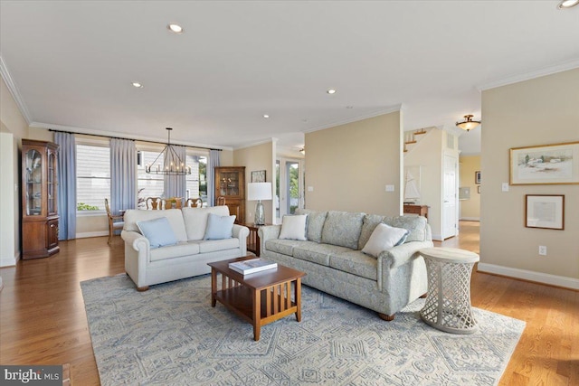 1100 Steamboat Rd, Shady Side, MD 20764 - living room with ornamental molding, a chandelier, light wood-style floors, baseboards, and recessed lighting