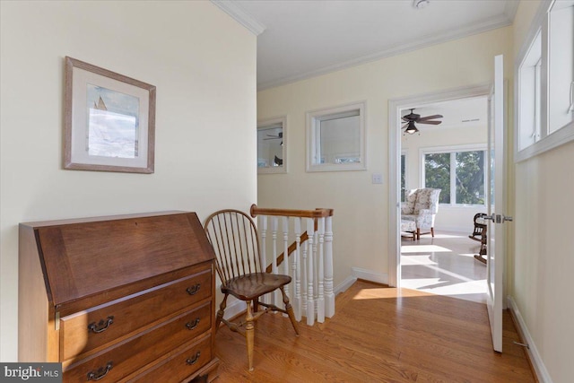 1100 Steamboat Rd, Shady Side, MD 20764 - corridor with ornamental molding, light wood-style flooring, and baseboards