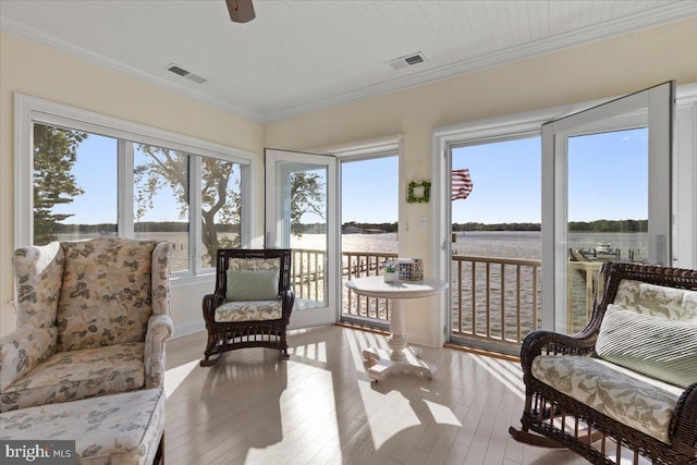 1100 Steamboat Rd, Shady Side, MD 20764 - sunroom / solarium featuring a water view, hardwood / wood-style floors, and crown molding