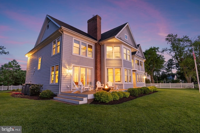 1100 Steamboat Rd, Shady Side, MD 20764 - rear view of house featuring a chimney, cooling unit, and a wooden deck