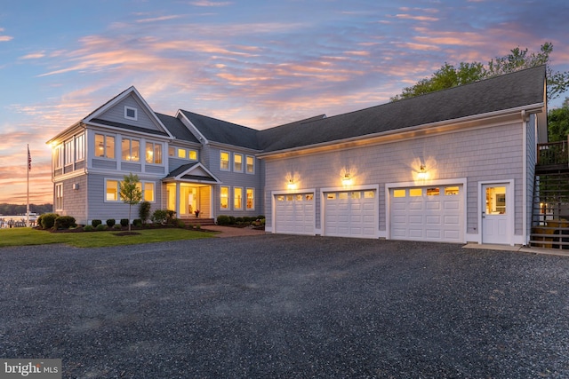 1100 Steamboat Rd, Shady Side, MD 20764 - view of front facade featuring gravel driveway and an attached garage