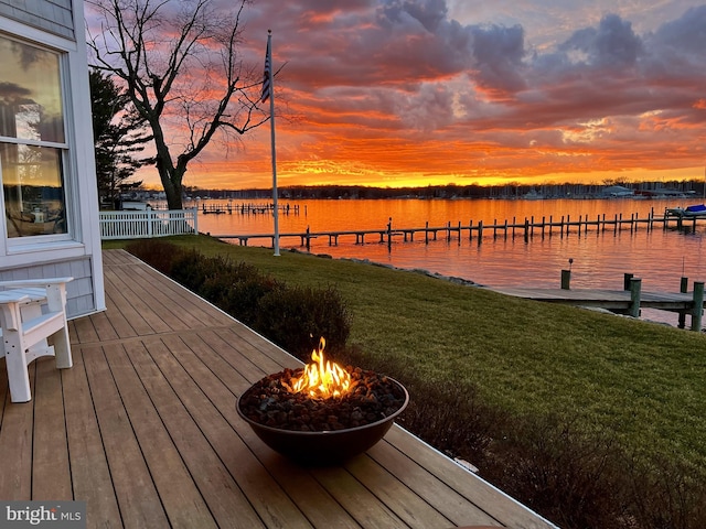 1100 Steamboat Rd, Shady Side, MD 20764 - dock area featuring a lawn, an outdoor fire pit, and a water view