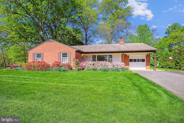 18312 Metz Dr, Germantown, MD 20874 - ranch-style home featuring a garage, brick siding, driveway, and a front lawn