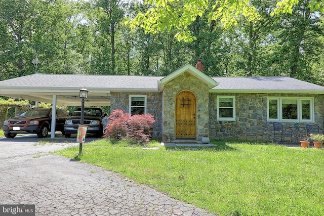 14308 Bristow Rd, Manassas, VA 20112 - view of front of house featuring stone siding, a chimney, driveway, and roof with shingles