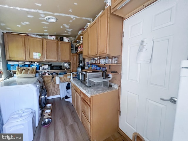 14308 Bristow Rd, Manassas, VA 20112 - kitchen featuring washing machine and clothes dryer and dark wood-style floors