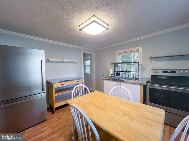 14308 Bristow Rd, Manassas, VA 20112 - kitchen featuring stainless steel appliances, light wood-type flooring, open shelves, ornamental molding, and a textured ceiling
