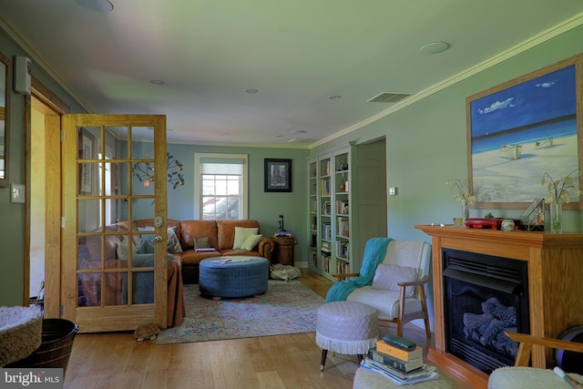 14308 Bristow Rd, Manassas, VA 20112 - living area with wood finished floors, ornamental molding, and a fireplace