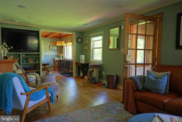 14308 Bristow Rd, Manassas, VA 20112 - living area featuring ornamental molding, wood finished floors, and a wainscoted wall