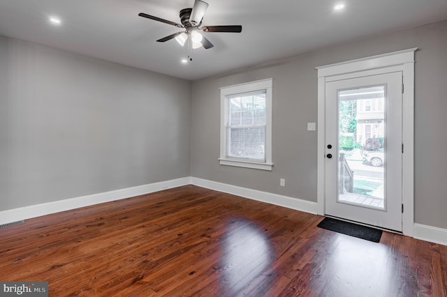 entrance foyer with wood finished floors, baseboards, a ceiling fan, and recessed lighting