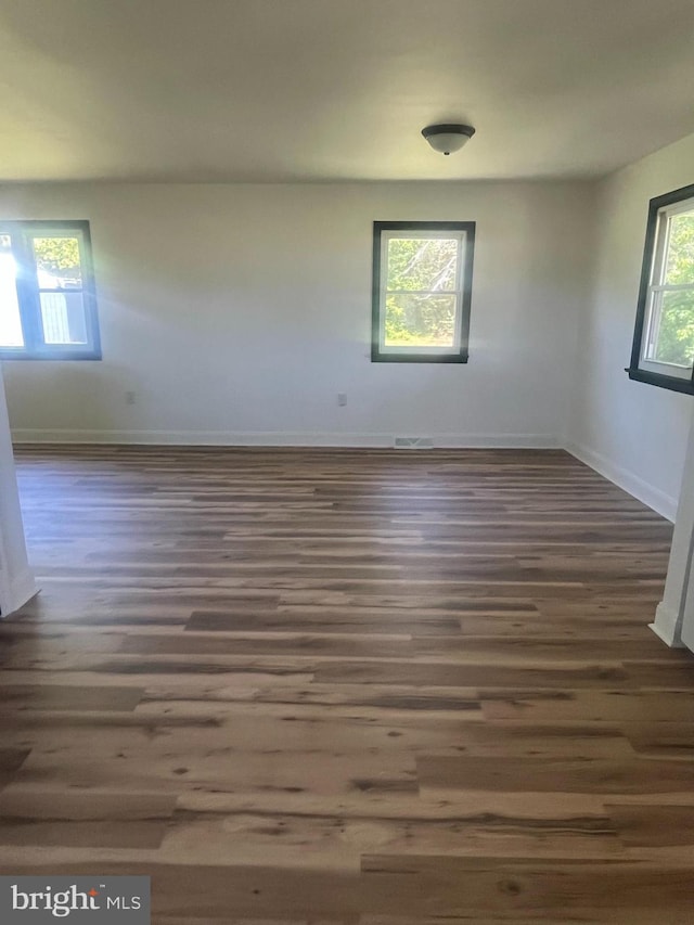 1807 Calvary Church Rd, Warsaw, VA 22572 - empty room with baseboards and wood finished floors