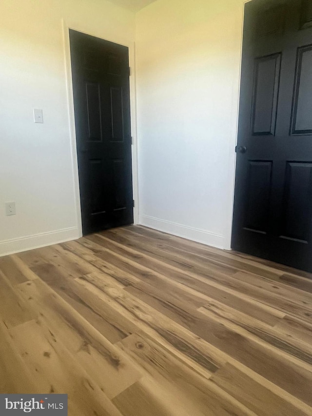 1807 Calvary Church Rd, Warsaw, VA 22572 - empty room featuring baseboards and wood finished floors