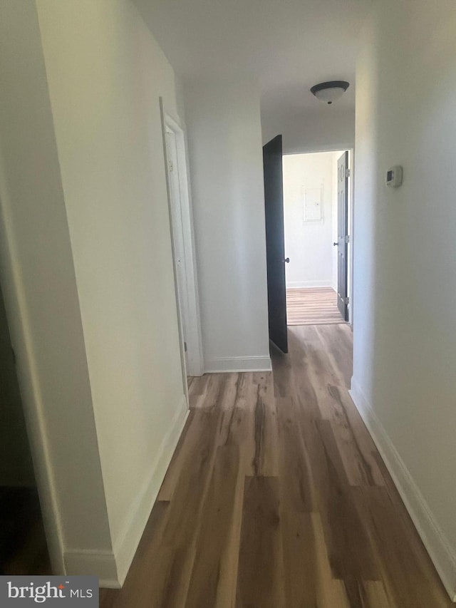 1807 Calvary Church Rd, Warsaw, VA 22572 - corridor with wood finished floors and baseboards